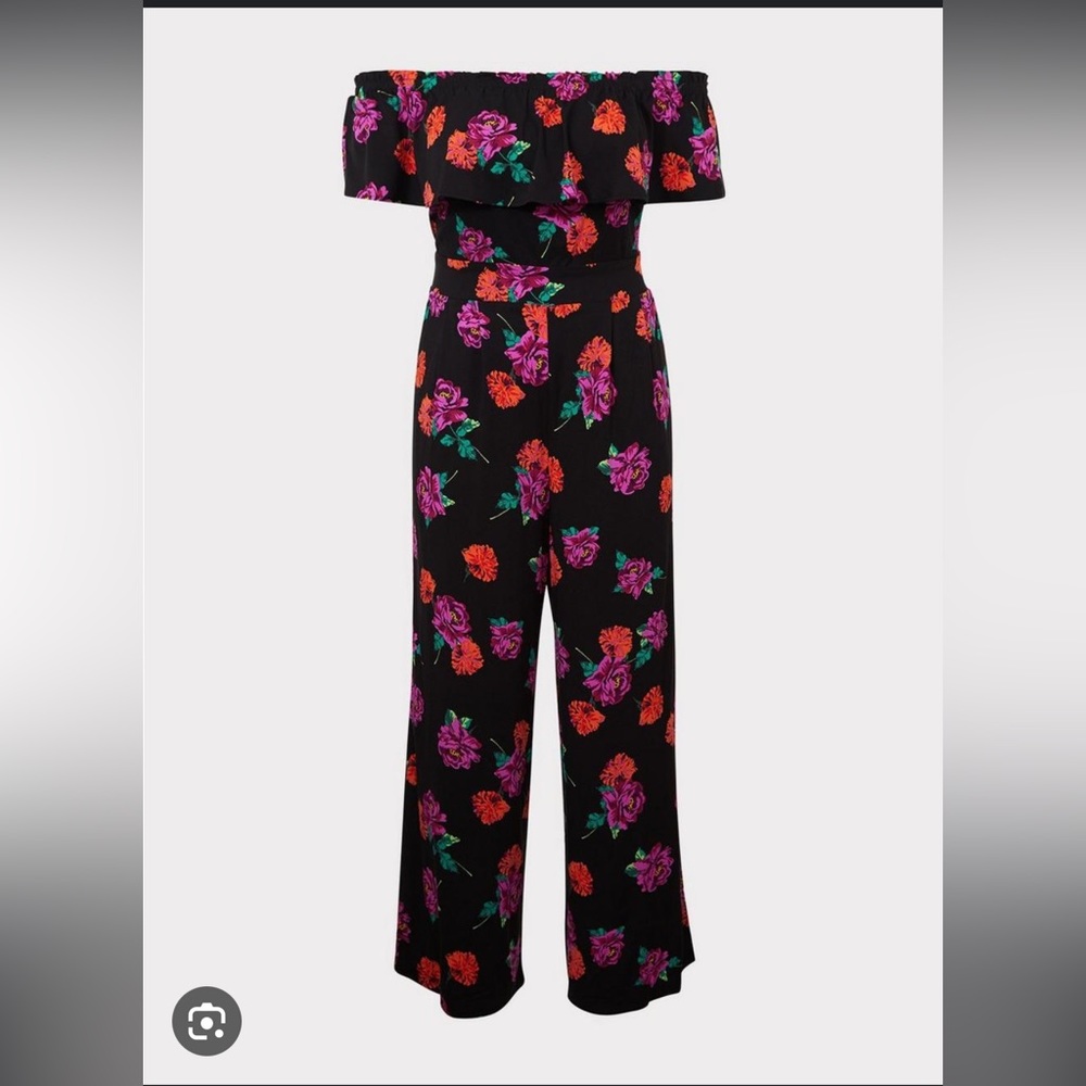 Black off shoulder jumpsuit with pink & orange floral print.